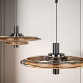 Modern Circular Pendant Lights With Metal Frame And Warm Illumination For Interior Spaces