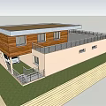 Modern Single Family Home With Wooden Exterior Balcony Metal Railing Patio And Lawn