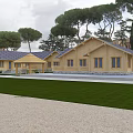 Wooden Detached Villa With Blue Roof Green Grass Lawn And Trees