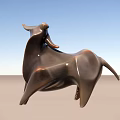Abstract Bull Sculpture Metallic Brown Finish Against Blue Sky And Sandy Ground