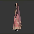 Man In Pink Traditional Attire With Gold Embroidery Standing Against Gray Background