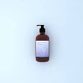 Decorative Ornament Set With Brown Pump Bottle And Purple Box On White Display Stand