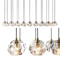 Modern Crystal Pendant Lights With Faceted Transparent Design And Golden Metal Brackets