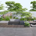 Courtyard Garden with Lush Green Plants Trees Stone Slab Flooring and Outdoor Seating