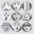 Nine Circular Artistic Decorative Pieces Featuring Different Abstract Face Designs And Patterns 3d model
