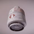 Silver Gray LPG Cylinder With Red Valve And Warning Label On Metal Surface