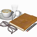 White Ceramic Coffee Cup With Latte Art Near Leather Notebook Eyeglasses And Pencils