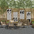 Outdoor Leisure Space With Bamboo Fence Scrolls Chinese Characters Straw Bales And Seating