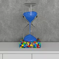 Decorative Ornament Set Featuring Blue Sand Hourglass on Colorful Building Blocks Base