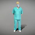 Man Standing in Teal Scrub Suit With Yellow Surgical Cap And Face Mask