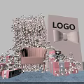 Floral Decoration Setup With Pink Floral Wall Sofa Gift Boxes And Bow Background Board