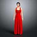 Portrait Of Elegant Woman In Red Long Dress Standing Against Gray Background