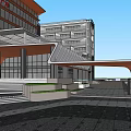 Modern Architectural Building With Glass Facade Orange Exterior Canopy Structure And Plaza Pavement