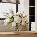 White and Pink Flowers Arrangement in Transparent Glass Vase with Green Leaves and Bookshelf