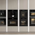Modern Built in Kitchen Appliances Integrated In Wooden Cabinets With Coffee Machine And Oven