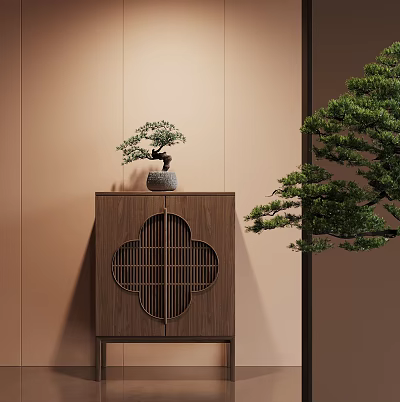 Wooden Decorative Cabinet with Quatrefoil Lattice Door Topped with Bonsai Tree Against Light Brown Wall 3d model