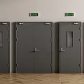 Solid Grey Double Doors With Green Exit Signs In Public Building Interior