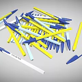 Pile of Blue Yellow and White Ballpoint Pens Scattered on Gray Background