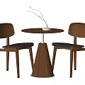 Wooden Round Table Set with Two Chairs Black Cushions and Vase Decoration