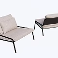 Modern Dining Chairs With Black Metal Frame And Light Colored Cushions