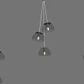 Modern Pendant Lights With Glass Shades And Gold Trim Hanging On Gray Wall Background