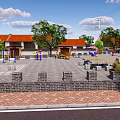 Village Public Square With Red Roof Buildings Trees Fitness Equipment Stone Walls And Benches