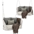 Cozy Wicker Hanging Chair With Gray Cushions And Brown Throw Blanket Design