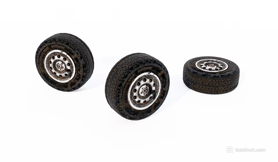 Three Black Model Tires With Silver Rims And Textured Tread Surface 3d model 