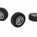 Three Black Model Tires With Silver Rims And Textured Tread Surface 3d model