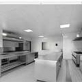 Commercial Catering Kitchen With Stainless Steel Worktables Ventilation Hoods And Tiled Surfaces