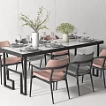 Modern Dining Table Set With Pink And Gray Chairs Vases Plants Tableware And Wine Glasses