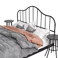 Double Bed with Black Metal Frame Gray Quilt Brown Blanket and Round Side Stools