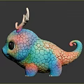 Colorful Dragon Like Figurine With Rainbow Scales Curled Tail Antlers And Large Eyes