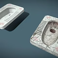 Pair of Squat Toilets One White with Red Patterns and Old Worn Stained Design