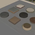 Various Shaped Floor Cushions In Different Materials On Gray Carpet Near Window