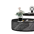 Modern Round Coffee Table With Marble Surface And Decorative Vase Magazines