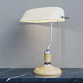 Vintage Cream Table Lamp with Curved Metal Arm Round Base on Black Marble Countertop