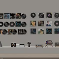 Headphones and Speakers Setup Featuring Wall Mounted Vinyl Records White Low Cabinet and Books