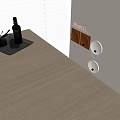 Whiskey Bottle and Crystal Glasses on Gray Tray with Minotti Decor and Window Blinds