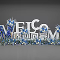 Floral Installation With Welcome Letters Blue White Flowers And Feather Accents