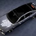 Metallic Gray Luxury Sedan Featuring Streamlined Body And Premium Alloy Wheels