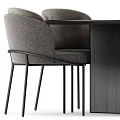 Modern Grey Upholstered Dining Chair With Slender Black Metal Legs For Stylish Home Dining Space