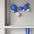 Blue And White Spherical Balls Wall Decor On White Wall With Shelf 3d model