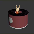 Red Decorative Cylinder with Black Top White Rabbit Holding Carrot and Side Blue Cross Window