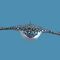Stunning Aquatic Animal Ray with Black and White Spotted Body and Wings in Blue Background