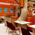 Vibrant Orange Noodle Restaurant With Handmade Noodles And Cozy Interior