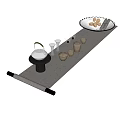 Traditional Tea Set With Teapot Teacups And Tray Arranged On Mat