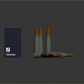 Military Bullets With Green Casings And Orange Tips Next To Blue Box