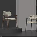 Modern Accent Chairs Featuring Wooden Arms Textured Fabric and Black Metal Legs with Patterned Design