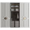 Modern Wardrobe With Glass Doors Circular Accents Hanging Rods And Storage Drawers